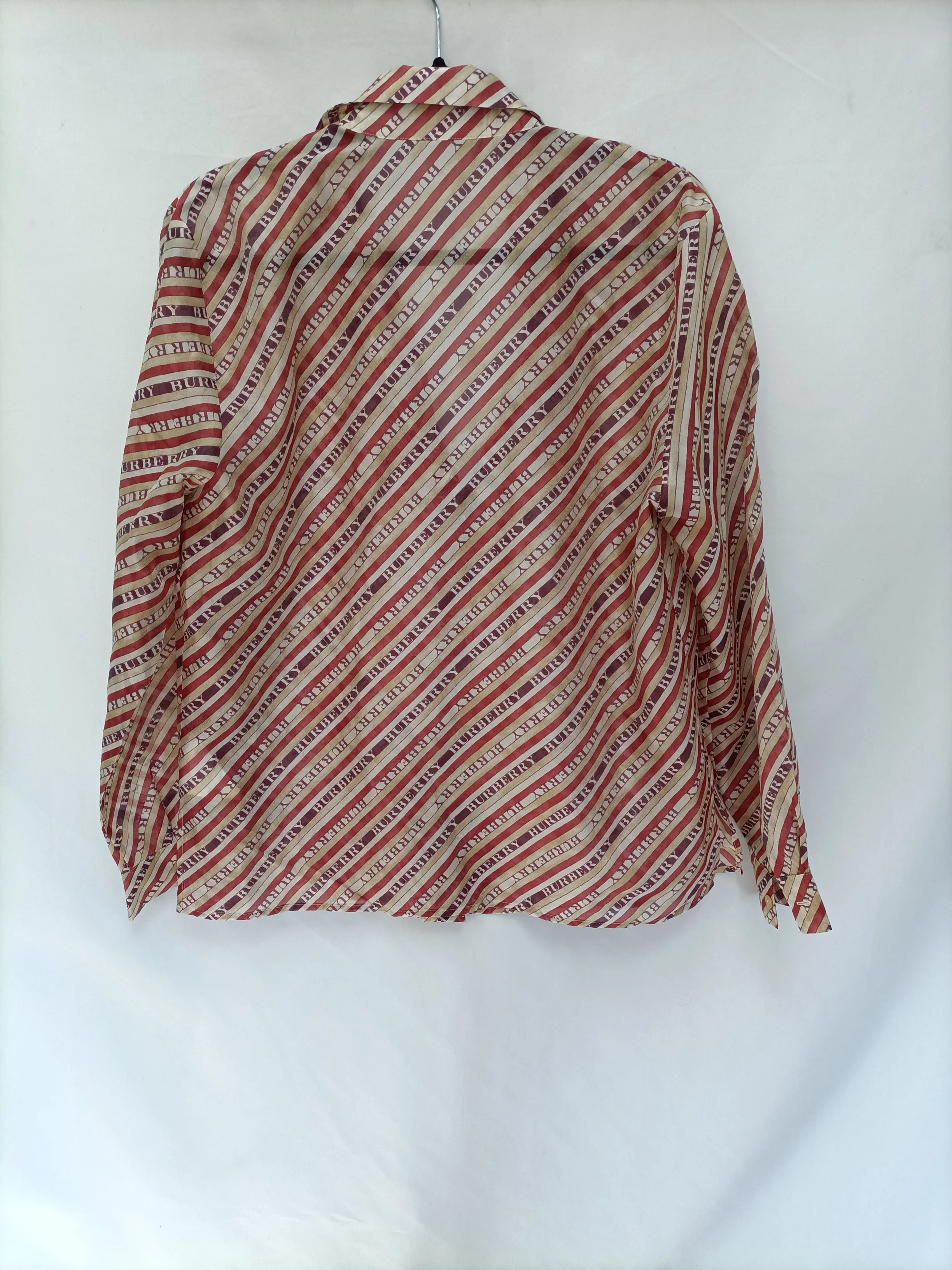 BURBERRY. Blusa  rayas semitransparente T.46